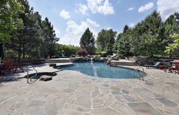 pool with flagstone deck