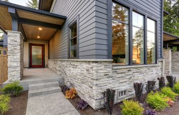 Stone veneers application for a moder house exterior.