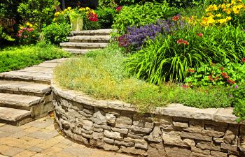 retaining wall iserving as a flower bed